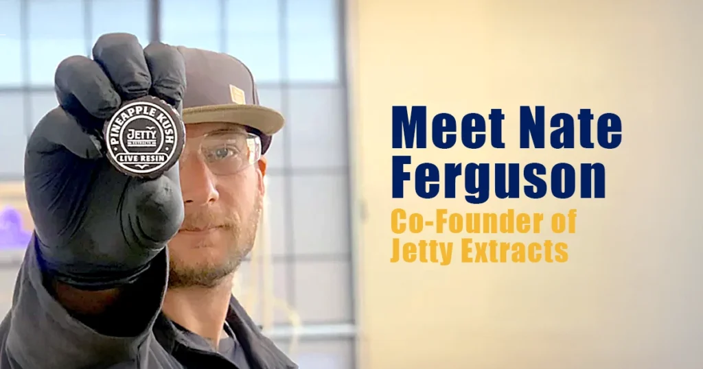 Nate Ferguson, co-founder of Jetty Extracts, wearing safety glasses and gloves while holding a Jetty Pineapple Kush live resin container toward the camera, with the text “Meet Nate Ferguson, Co-Founder of Jetty Extracts.”