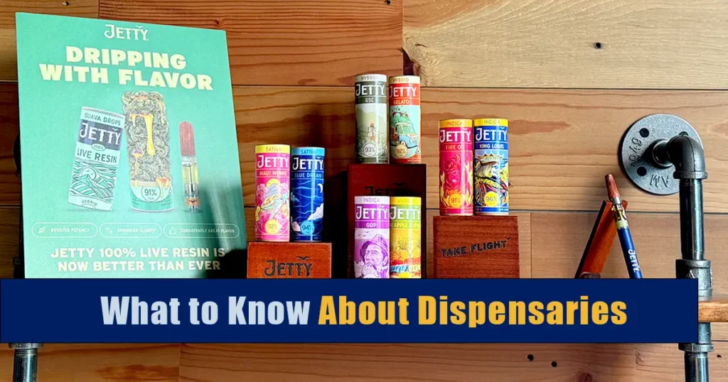 Display of Jetty vape products and packaging on wooden shelves, including colorful disposable vape tubes and a “Dripping With Flavor” live resin poster, with the headline “What to Know About Dispensaries.”