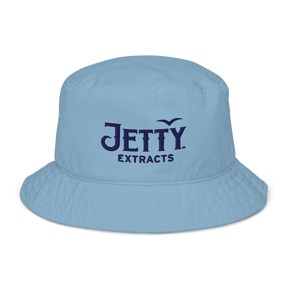 Jetty Extracts baby blue bucket hat with navy 3D puff embroidered logo flat lay view