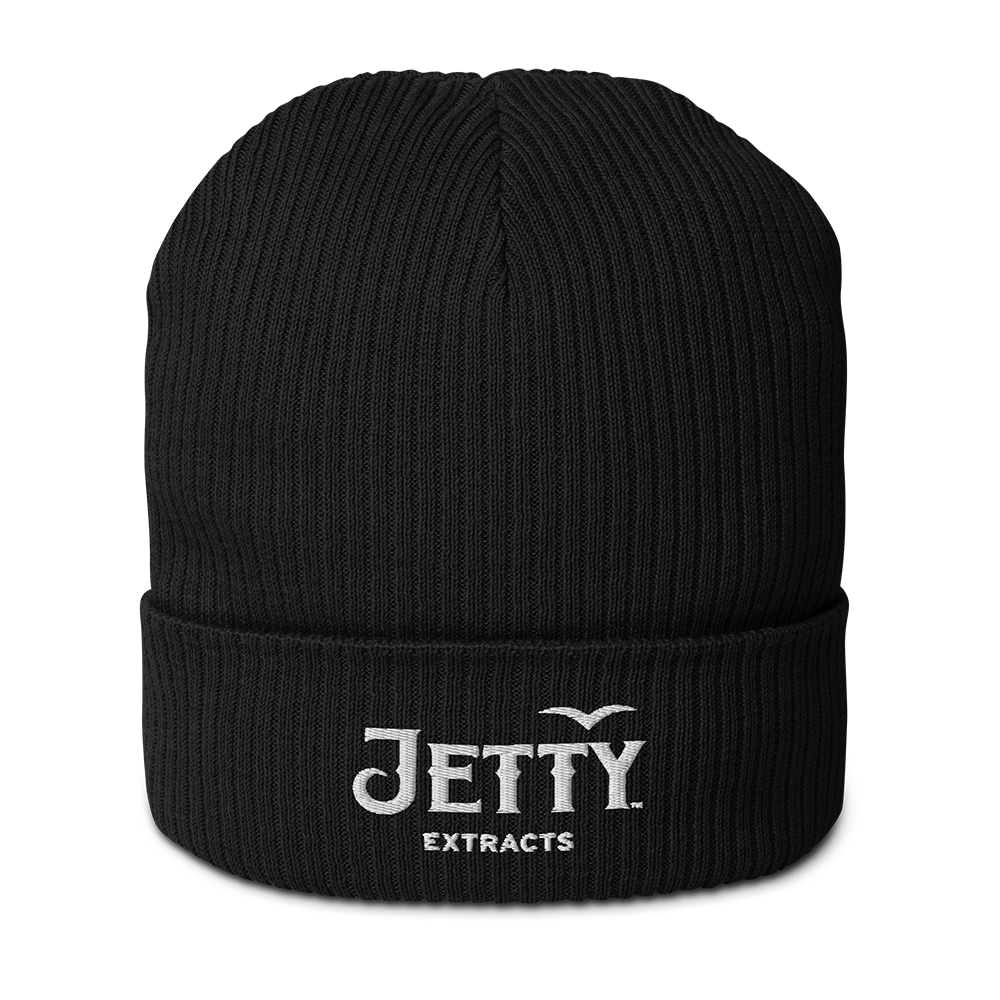 Black Jetty Extracts beanie featuring a white embroidered logo on the front