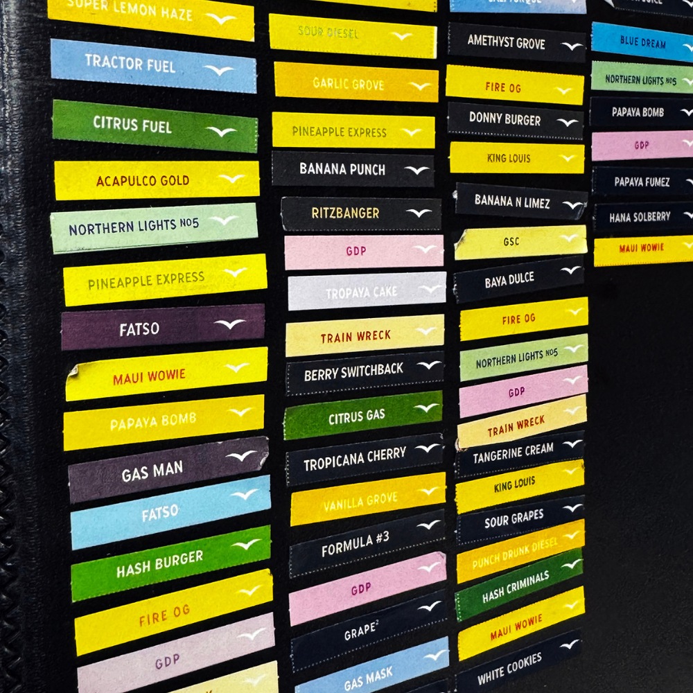 Rows of colorful Jetty Extracts peel-n-stick Vape cart labels.