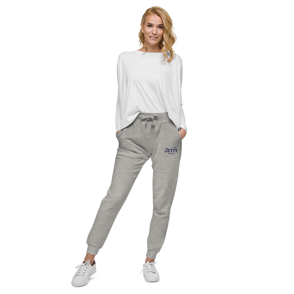 Gray fleece sweatpants with navy embroidered Jetty Extracts logo — cannabis streetwear