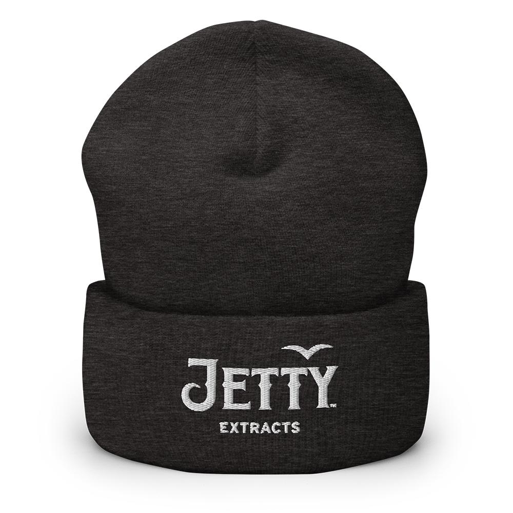 Dark gray cuffed ribbed beanie embroidered Jetty Extracts logo front
