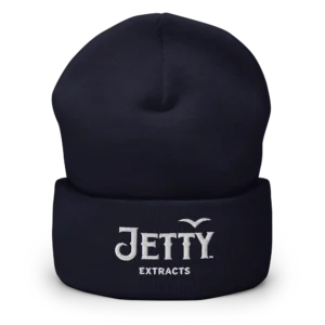 Dark navy cuffed ribbed embroidered beanie with white Jetty Extracts logo