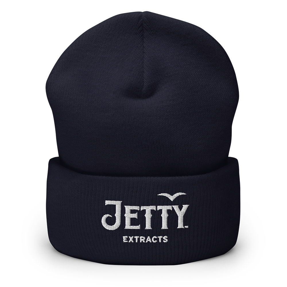 Dark navy cuffed ribbed embroidered beanie with white Jetty Extracts logo