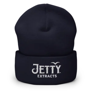 Close-up of navy blue cuffed 420 beanie with white embroidered stitching, soft cotton blend cannabis lifestyle beanie